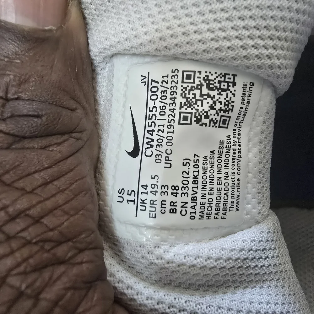 White and Black Athletic Shoes with Orange‎ Highlights